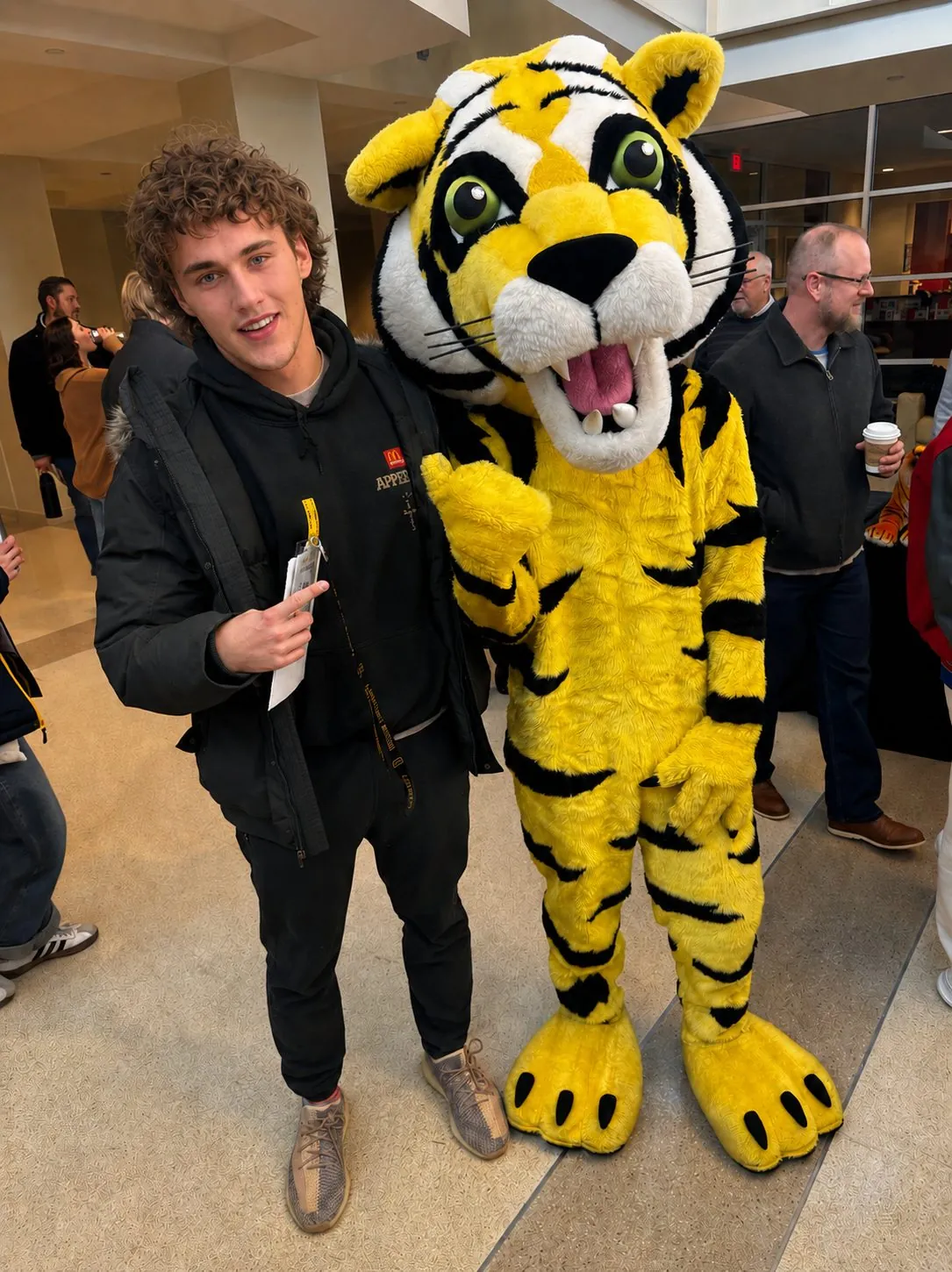 Luke with the DePauw Tiger mascot on campus